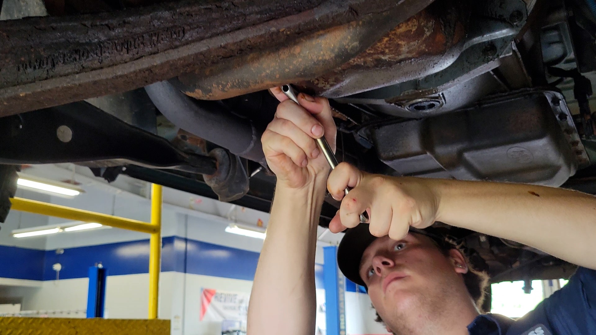 mechanic fixing car